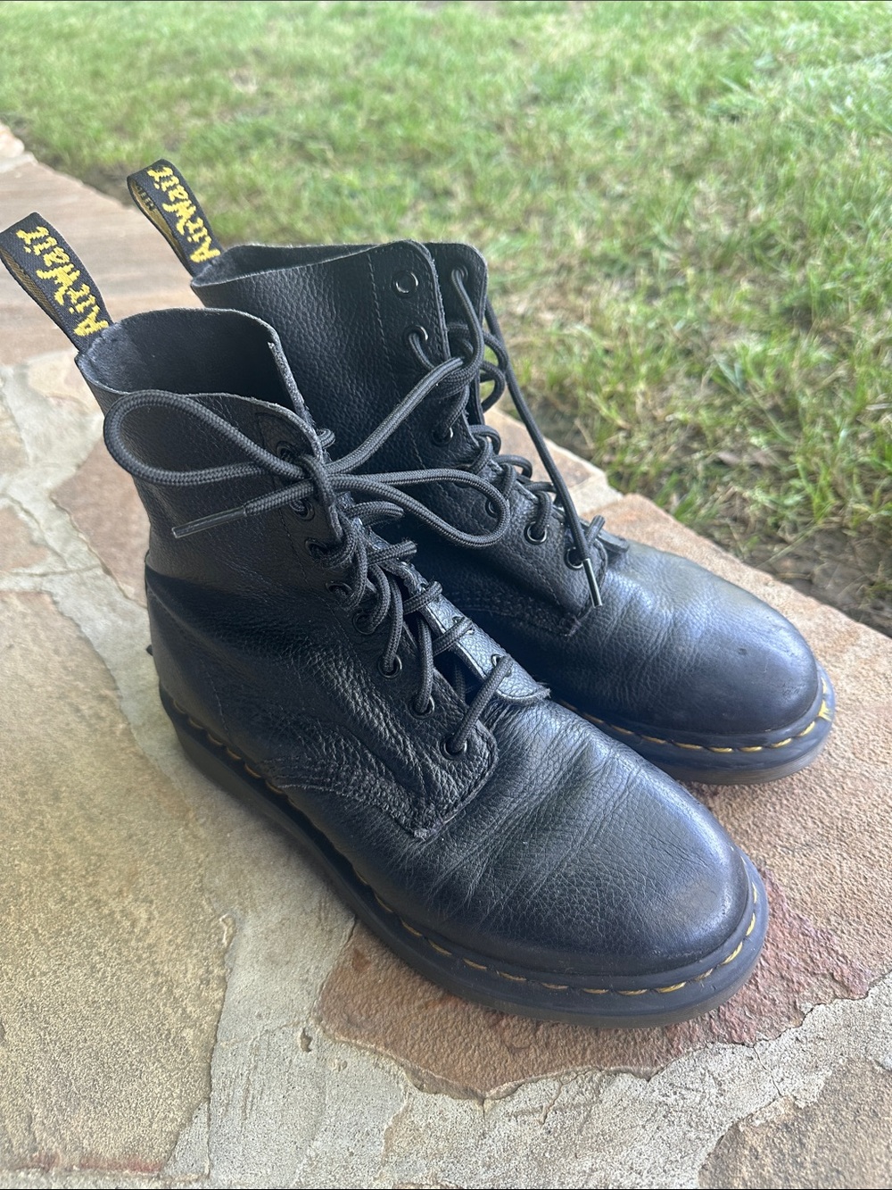 Dr. Martens Black Leather 8-Eye Lace-Up Boots with Yellow Heel Loop